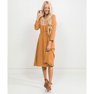 RooLee style mustard quarter sleeve length dress